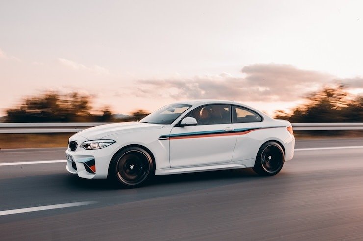 white-sport-sedan-with-colorful