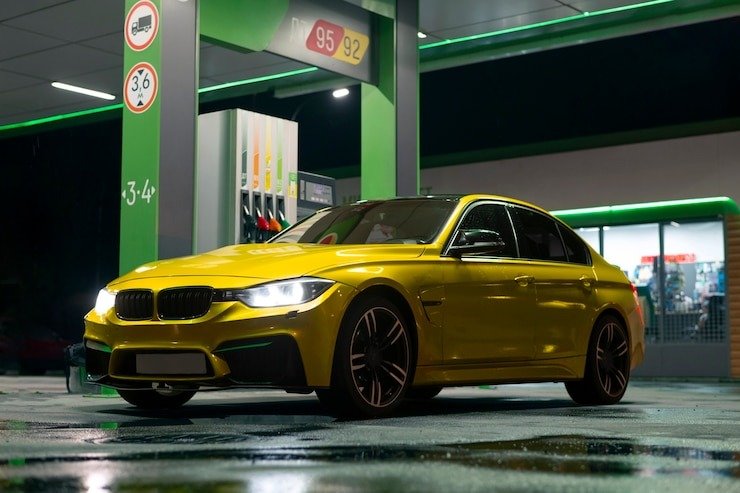 yellow-car-gas-station_23-215069