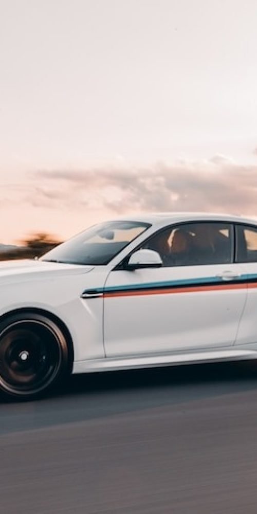 white-sport-sedan-with-colorful